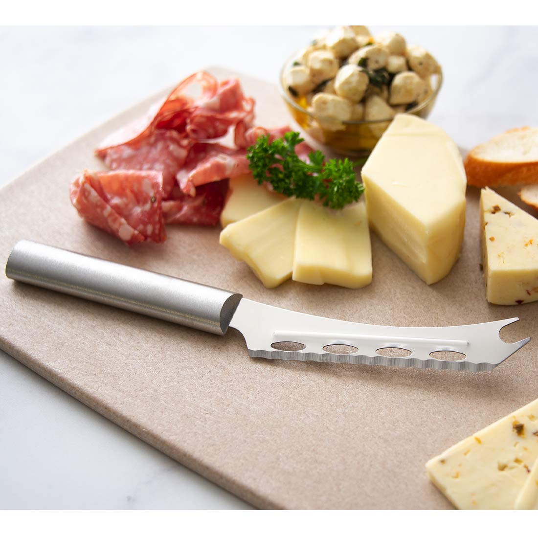 Rada Cutlery Cheese Knife (R139), 5.25" Stainless Steel Serrated Blade with Ridged Cutouts and Forked End, Silver Handle