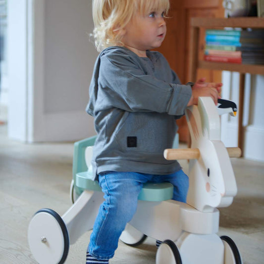 Tender Leaf Toys - Running Rabbit Ride On - Wooden Four Wheeled Push Balance Rabbit Themed Bike with Rubber Ring and Handle - Early Walk Development and Muscle Strength Enhancement for Children 18M+