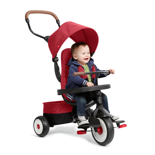 Radio Flyer City 4-in-1 Stroll 'N Trike, Red, for Riders 1-5 Years Old, 4 Riding Modes, 3 Point Harness with Comfort Pad, Parent Controlled Steering, Rear Storage, Stroller Tricycle for Toddlers