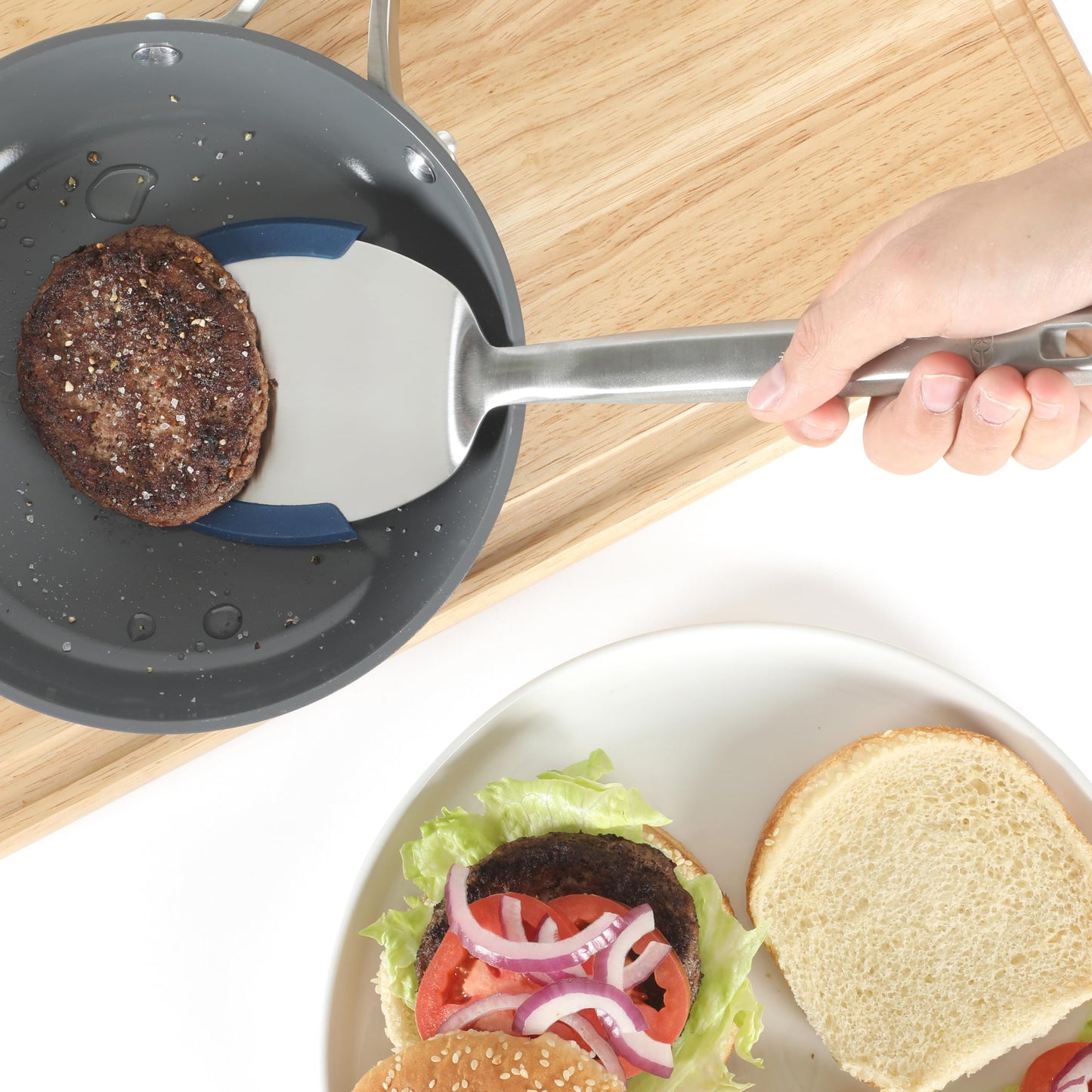 Calphalon Prime Stainless Steel Turner with Navy Blue Silicone Rim, Slotted Spatula, Heat-Resistant, Durable Kitchen Tool for Cooking and Serving