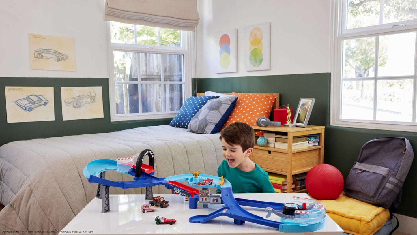 Mattel Disney and Pixar Cars Playset with 2 Toy Cars, Lightning McQueen & Francesco Bernoulli, GRC Jumping Raceway Track Set with Kid-Powered Booster