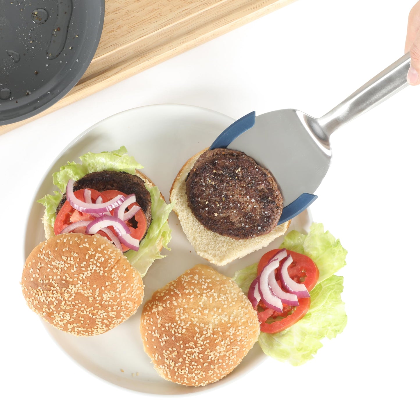 Calphalon Prime Stainless Steel Turner with Navy Blue Silicone Rim, Slotted Spatula, Heat-Resistant, Durable Kitchen Tool for Cooking and Serving